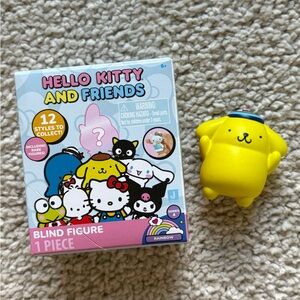 Pompompurin figurine from hello kitty rainbow series blind box